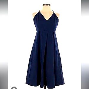 Elia Cher navy cocktail summer dress. Adjustable straps, zips up back. Medium